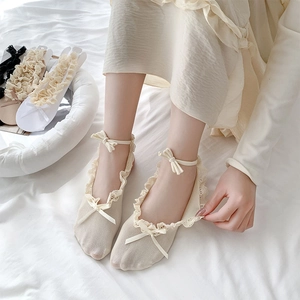 Detailed lace trim socks with silk ribbon bow and breathable mesh fabric texture