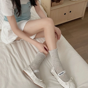 Light grey hollow mesh socks with bow patterns and ruffled wood ear edges for women