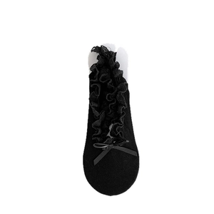 Ballet style black lace ruffle socks with bow detail and breathable mesh fabric