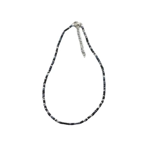 Minimalist black and white beaded choker necklace with adjustable silver clasp for women