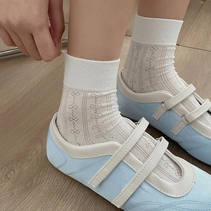 White ballet-style mesh socks with hollow patterns and bow ties for a vintage JK look