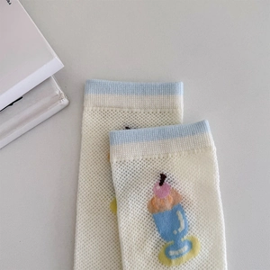 Detail of breathable mesh cotton socks with cute cartoon ice cream print and blue trim