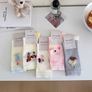 Detail of five pairs of breathable mesh socks with cute cartoon animal embroidery