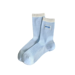 Light blue ribbed knit socks with white trim and Ciao Sox embroidered label