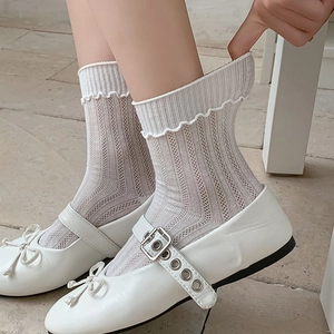 White frilly mesh socks and Mary Jane shoes with bow detail for a sweet summer look
