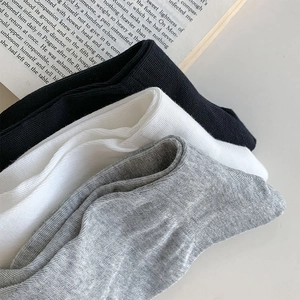 Detailed view of ribbed texture and rolled edges on breathable cotton crew socks