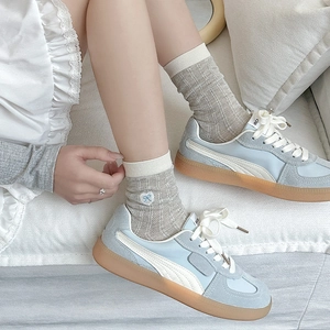 Light blue suede sneakers with white wave side stripe and grey heart embroidery socks