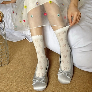 White hollow-out mesh socks with double ruffle trim and floral knit patterns for summer