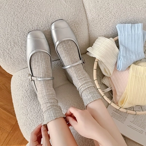 Breathable mesh crew socks in pastel colors styled with silver Mary Jane shoes
