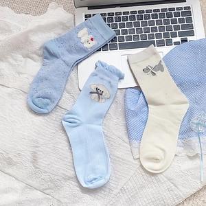 Cute Japanese style dog embroidered crew socks with bow tie and lace trim in blue and white