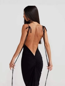 Elegant black backless bodycon maxi dress with ruched detail and slim spaghetti straps