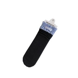 Women's crew socks with black vertical ribs and blue-white plaid ruffle trim accents