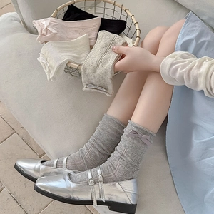 Bow-knot mesh socks for women featuring breathable hollow knit in pastel colors