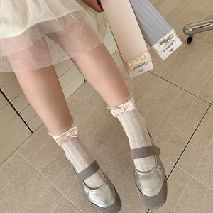 Lace-trimmed girls' crew socks with cute bows in white, pink, and light blue colors