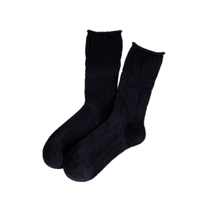 Classic black ribbed knit crew socks with minimalist rolled edge design for women