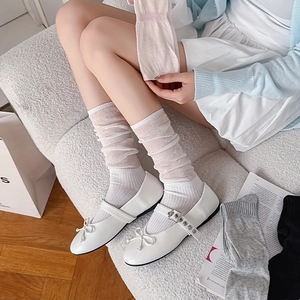 Japanese style white slouch socks paired with Mary Jane shoes for a sweet schoolgirl look