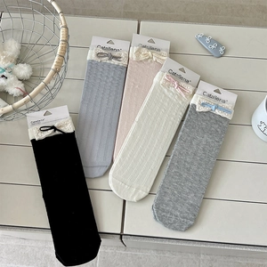 Detailed close-up of 5-pack girls' lace socks with bow accents in various colors
