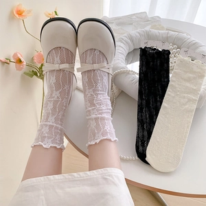 Detail of floral lace mesh socks featuring sweet ruffled edges and breathable hollow design