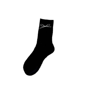 Elegant black crew socks with white bow design for women featuring breathable mesh fabric