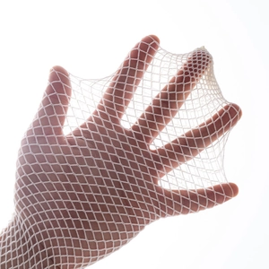 Detailed close-up of white lace mesh fabric showing high elasticity and uniform texture