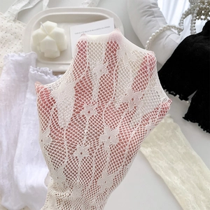 Macro shot showing delicate lace mesh gloves with floral textures in multiple colors