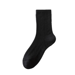 Classic black ribbed crew socks in breathable cotton blend shown from a 45-degree angle