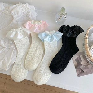 Pastel ruffled crew socks with heart knit pattern in cream, pink, blue and black