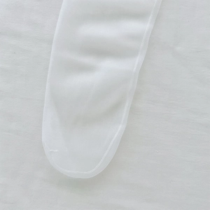 Detail of white sheer mesh fabric with fine reinforced stitching for Lolita style socks