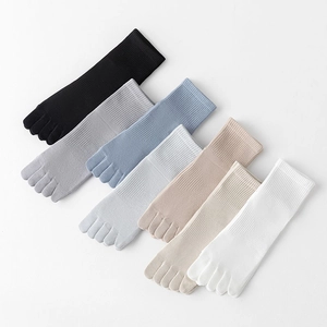 Detail showing various colors of breathable cotton five-finger toe socks for men