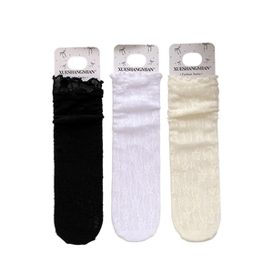 Three pairs of floral lace mesh socks for girls with ruffle trim in black, white, and beige