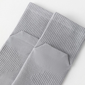 Detail of grey ribbed knit toe socks showing reinforced heel and breathable texture