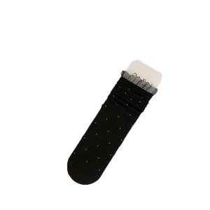 Black polka dot crew socks with grey lace trim on white cardboard display card