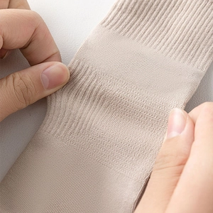 Macro shot of high-stretch ribbed fabric showing elastic durability of five-toe socks