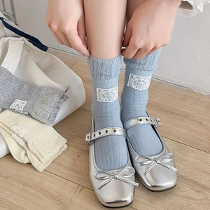 Sweet Korean style lace crew socks for women featuring lucky patches and Mary Jane shoes
