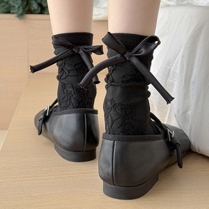 Japanese style black mid-calf socks featuring 3D bow back and embossed bear pattern