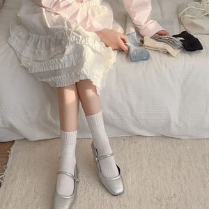 Detail of sweet lace-style crew socks in five colors with delicate floral embroidery
