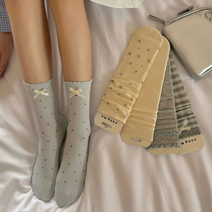 Set of cute Korean style crew socks for women featuring polka dots and bowknot details