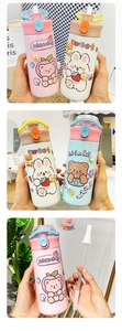 Detail of cute cartoon 304 stainless steel thermos with leakproof straw and 3D bear charms
