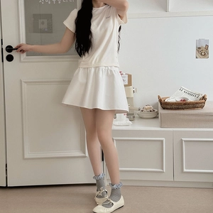 Detail of white ruffle crew socks paired with Mary Jane flats for a sweet style