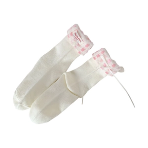 Chaussettes mi-mollet blanches à revers à carreaux roses et nœud en ruban délicat