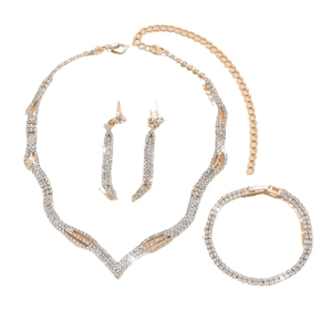 Sparkling silver rhinestone necklace, bracelet, and earrings bridal jewelry set