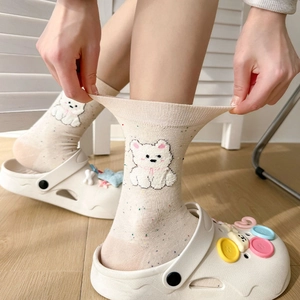 Chaussettes beiges avec broderie ours et mouchetures colorées avec sabots blancs