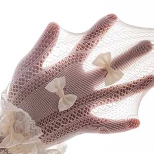 Detail view of off-white lace mesh gloves featuring delicate bows and ruffled edges