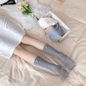 Mid-calf white lace socks for women with pearl accent and diamond knit pattern