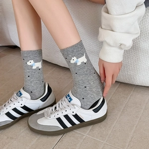 Mid-calf grey polka dot socks with cute puppy embroidery and blue bow detail
