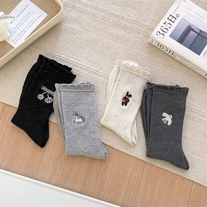 Detail of cotton crew socks with cartoon embroidery and scalloped edges set