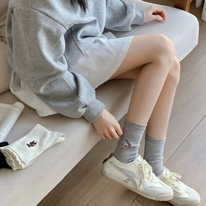 Japanese style grey crew socks with cute animal embroidery and ruffle trim details