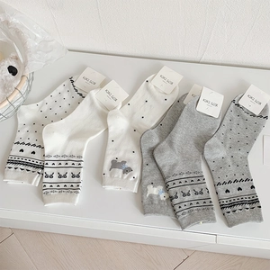Detailed view of 5-pack cotton crew socks with animal embroidery and diverse patterns