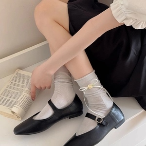 Japanese style grey knit crew socks with yellow flower and bow accent in Mary Janes