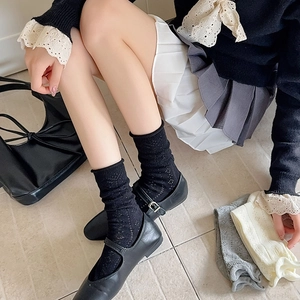 Detailed knit pattern and ruffled cuff of mesh breathable crew socks for women